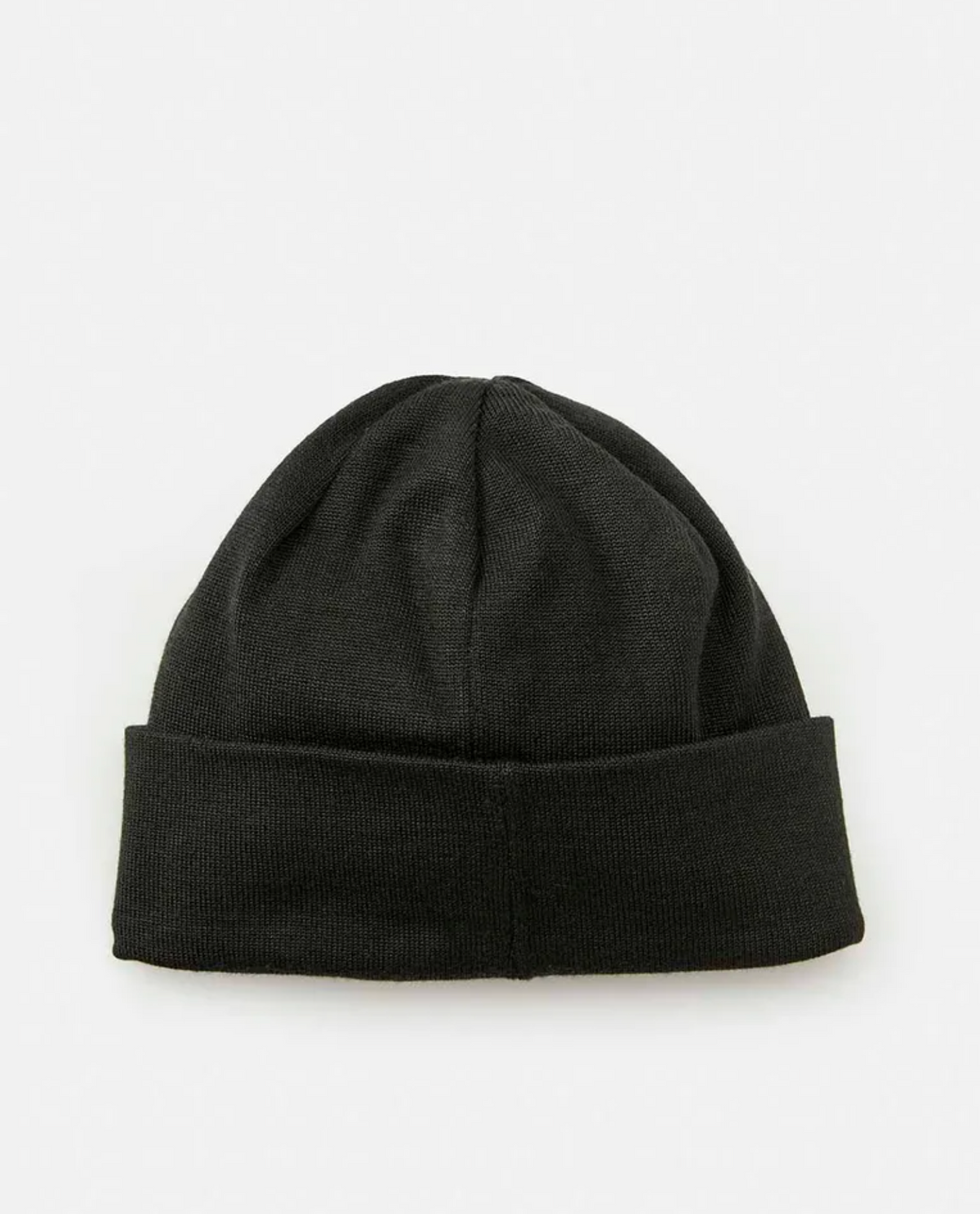 The Rip Curl Anti-Series Regular Beanie, black and knitted with a turned-up brim, offers warmth and comfort. Presented on a plain white background, this water-repellent accessory is ideal for facing the elements in style.