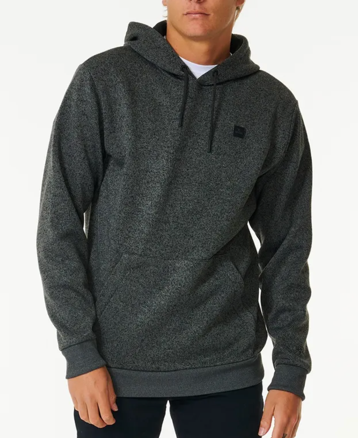 A person wears a dark gray Rip Curl Anti Series Crescent Hood sweatshirt with a front pocket and drawstrings, standing against a plain white background.