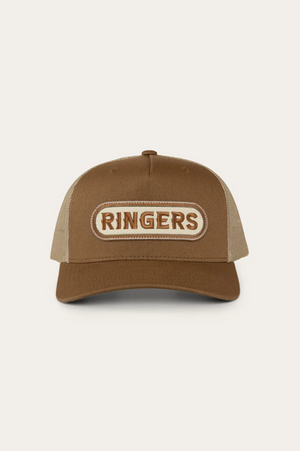 The Ringers Western Jaxton Trucker Cap features a brown and beige cotton twill design with a mesh back for breathability and an embroidered "RINGERS" patch on the front, highlighting its signature style.