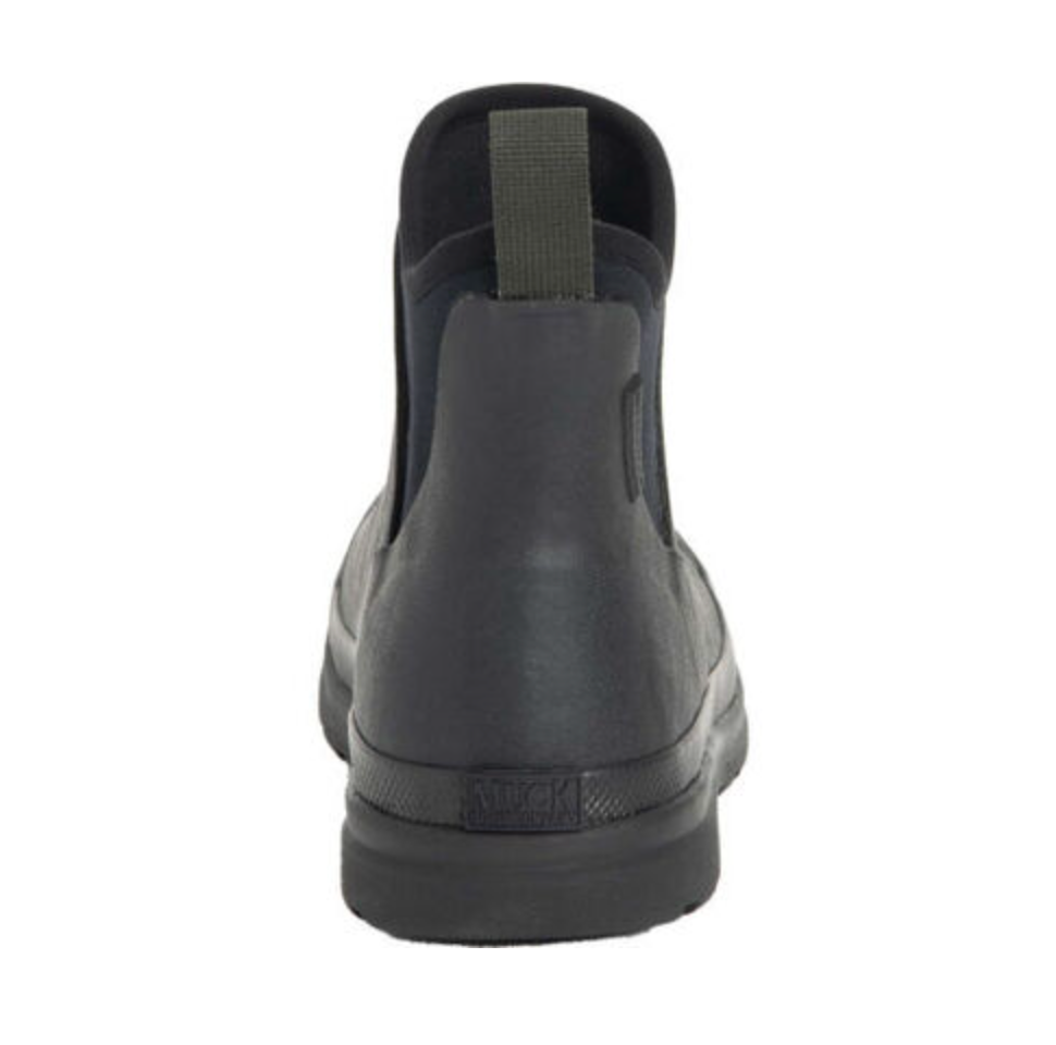 A rear view of the Muck Boot Originals Womens Ankle Boot in black, showing a pull tab, textured sole, and antimicrobial footbed, photographed against a white background.