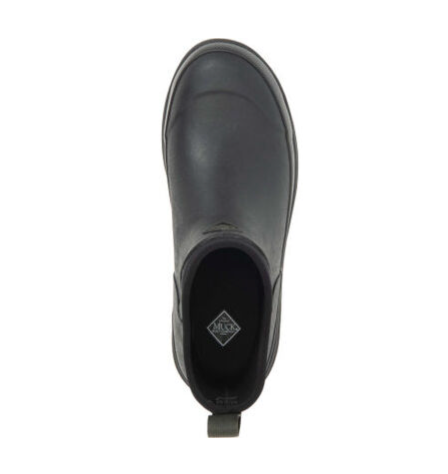Top view of the Muck Boot Originals Women's Ankle Boot in black rubber with a pull tab. It has a logo-stamped inner sole, antimicrobial footbed for comfort, and a smooth matte waterproof exterior to keep feet dry in any weather.