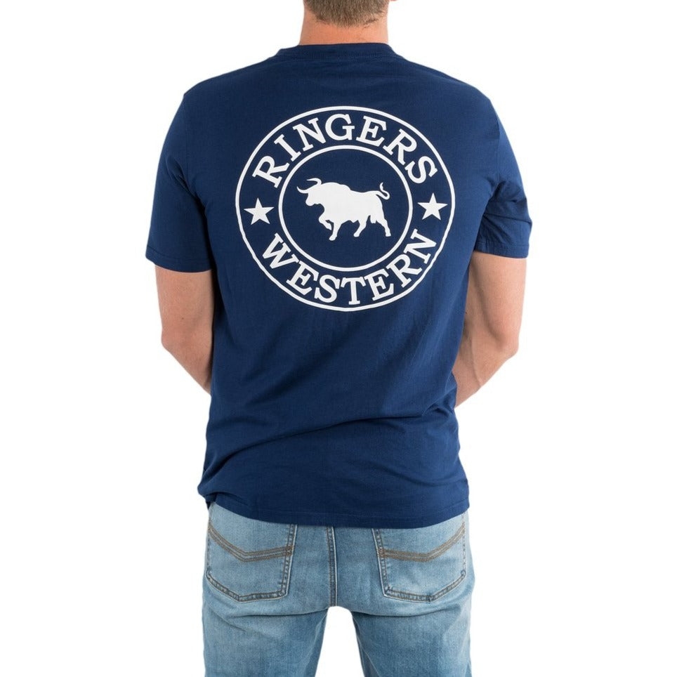 A rear view shows a person in a blue Ringers Western Signature Bull Classic T-Shirt, made from 100% cotton, featuring a circular logo with a bull and two stars, paired with light blue jeans.