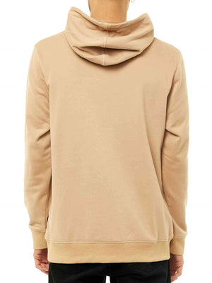 A person is shown from the back wearing a Rusty Short Cut Hooded Fleece in beige with the hood down and sleeves to the wrists, paired with black pants.