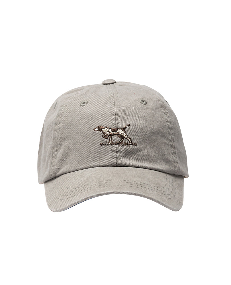 The Rodd & Gunn Signature Cap features an embroidered dog on the front. Made from durable beige cotton twill, this baseball cap includes a curved brim and visible stitching accents for added style.