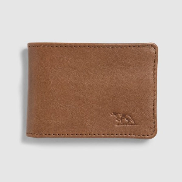 The Rodd & Gunn Victoria Flats Road Wallet is a smooth-textured, light brown buffalo leather wallet with visible stitching. It features a small embossed animal logo on the bottom right corner and has multiple card slots, set against a neutral background.
