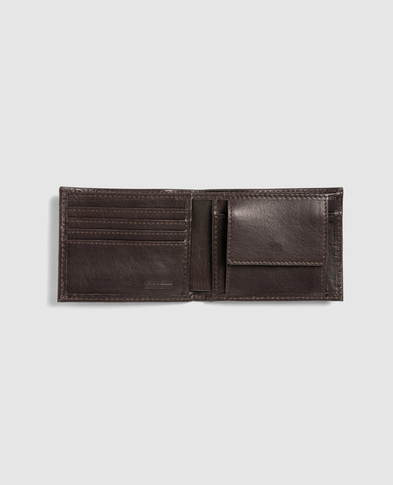 The Rodd & Gunn Leeston Dunsandel Road Wallet is shown open on a white background, displaying multiple card slots on the left and a coin pocket with snap closure on the right.