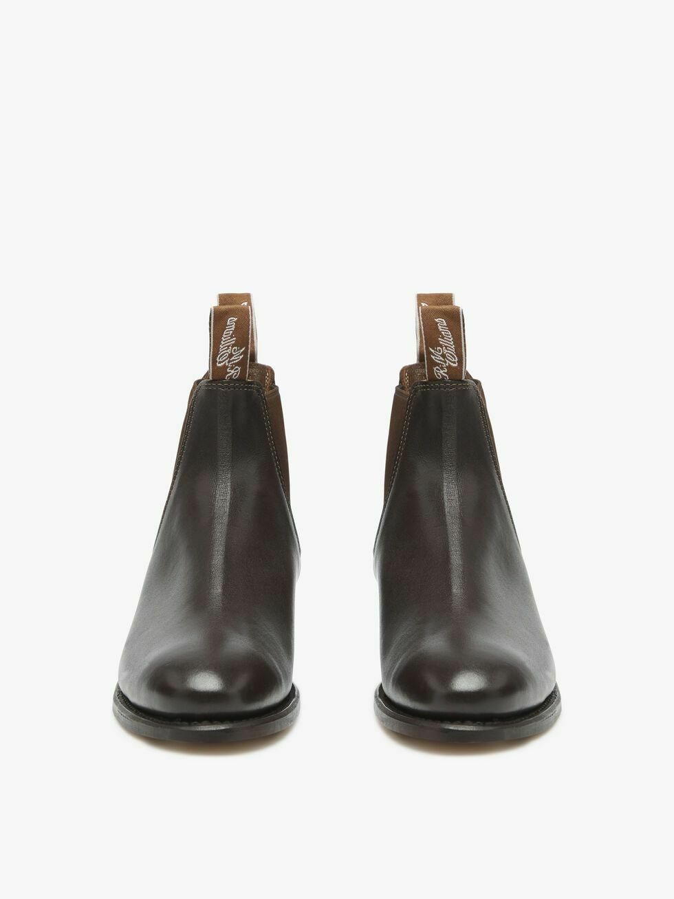 The RM Williams Adelaide Kangaroo Boot is a pair of dark brown kangaroo leather Chelsea boots with pull tabs, shown from the front against a plain white background.