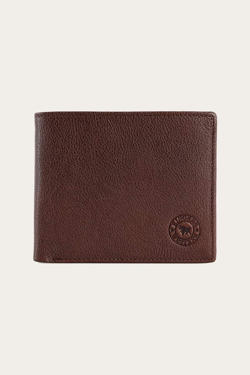 The Ringers Western Bayview Wallet, made of genuine leather with a textured finish and circular embossed logo at the bottom right, is displayed on a light background. This accessory adds sophistication to your essentials.