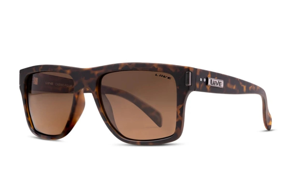 Introducing the Liive Casino Polar Sunglasses: featuring a modern, rectangular style with a brown tortoiseshell frame and brown-tinted, polarized lenses. The "Liive" logo is prominently displayed on the arms beside the lenses. These sunglasses are ideal for both casual and outdoor use, offering excellent UV protection.