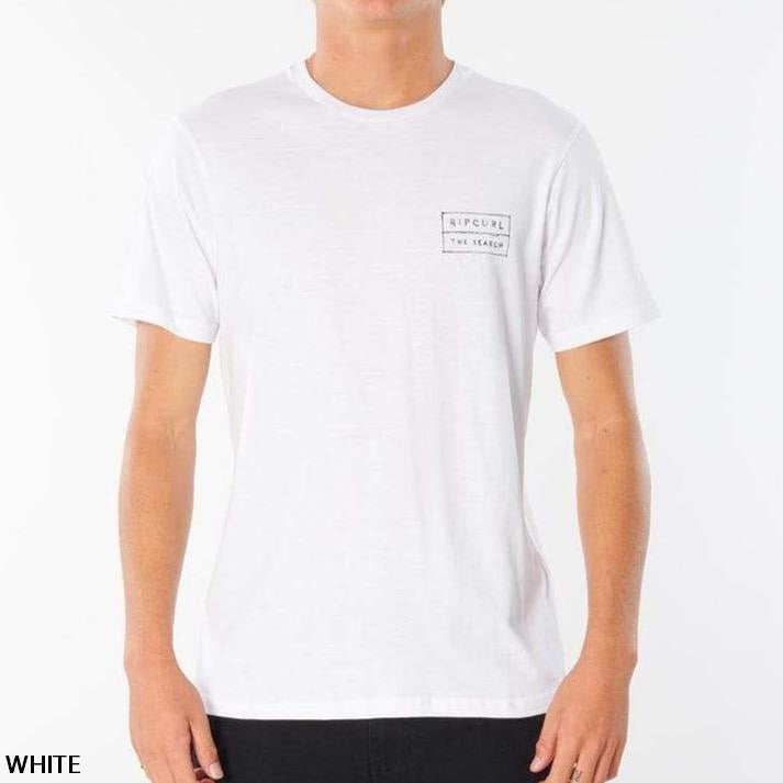 A person is wearing the Rip Curl 50/50 Scratch Tee, featuring a white short-sleeved design made from 100% cotton. The tee has a small square logo on the left chest that reads "Rip Curl, The Search." With its comfortable fit, the tee sets a relaxed tone as the person stands against a plain white background. The word "WHITE" is visible in the bottom left corner of the image.