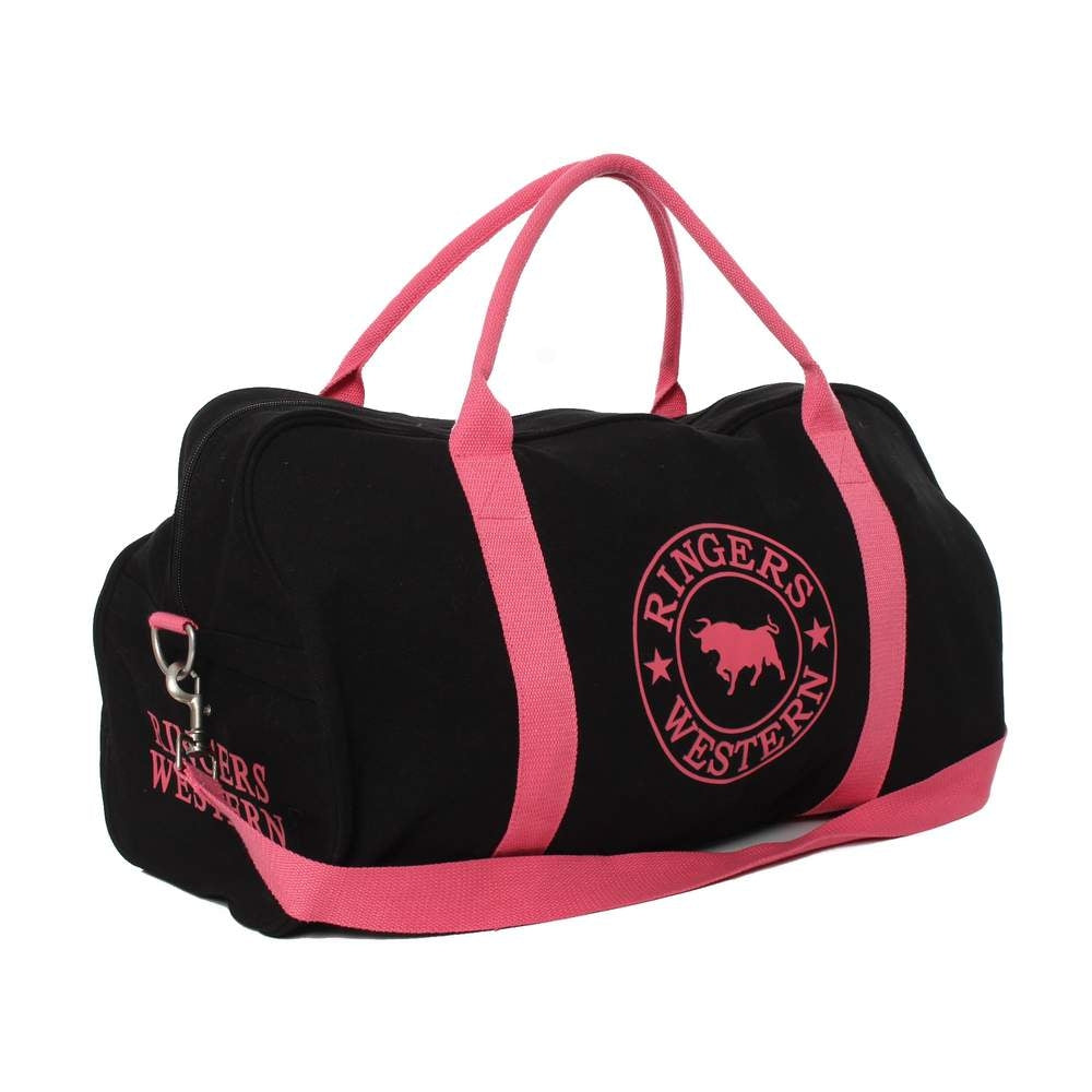 The Ringers Western Gundagai Duffle is a black duffle bag with pink straps and accents, crafted from durable cotton canvas. Featuring the brand name "Ringers Western" with a bull logo on the side, this bag includes a zippered main compartment and a small side pocket, both adorned with the same distinctive branding.
