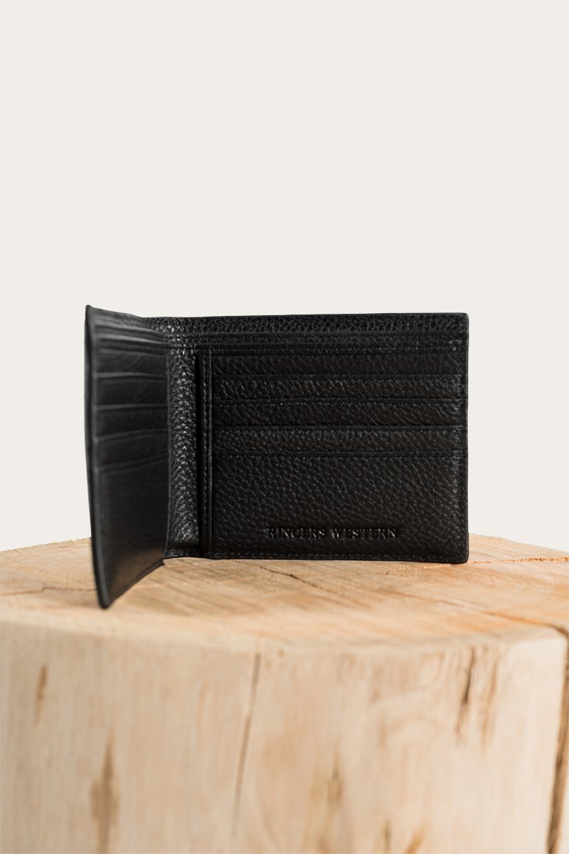 A textured black Ringers Western Duke Wallet is open, revealing multiple card slots inside. It is displayed standing on a light wooden surface with a neutral background. The brand name "HINGE & LIFTON" is embossed on the lower right corner of this genuine leather wallet.