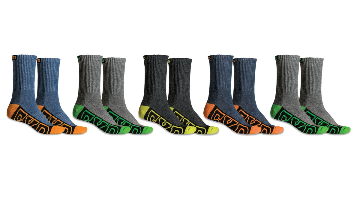 The FXD SK-1 Crew Sock 5 Pack is displayed in a row, showcasing six pairs of durable crew socks. From left to right, the first and sixth pairs are blue with orange accents, the second and fifth pairs are grey with green accents, and the third and fourth pairs are dark grey with yellow accents, all offering excellent arch support.