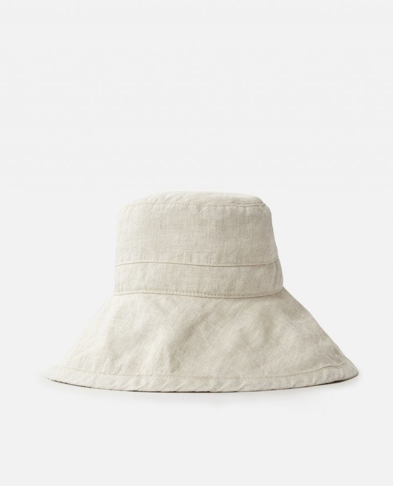 The Rip Curl Tres Cool UPF Sun Hat is a beige, wide-brimmed accessory made of organic cotton, showcased on a plain white background. Its textured fabric and slightly floppy brim offer a simple, stylish design for effective sun protection.