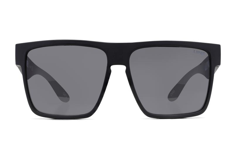 A pair of black, square-framed Liive Greed Sunglasses with dark-tinted, polarised grey lenses. The frame boasts a simple, sleek design with slightly thick arms. The front view highlights its symmetric, modern style while ensuring UV protection for your eyes.