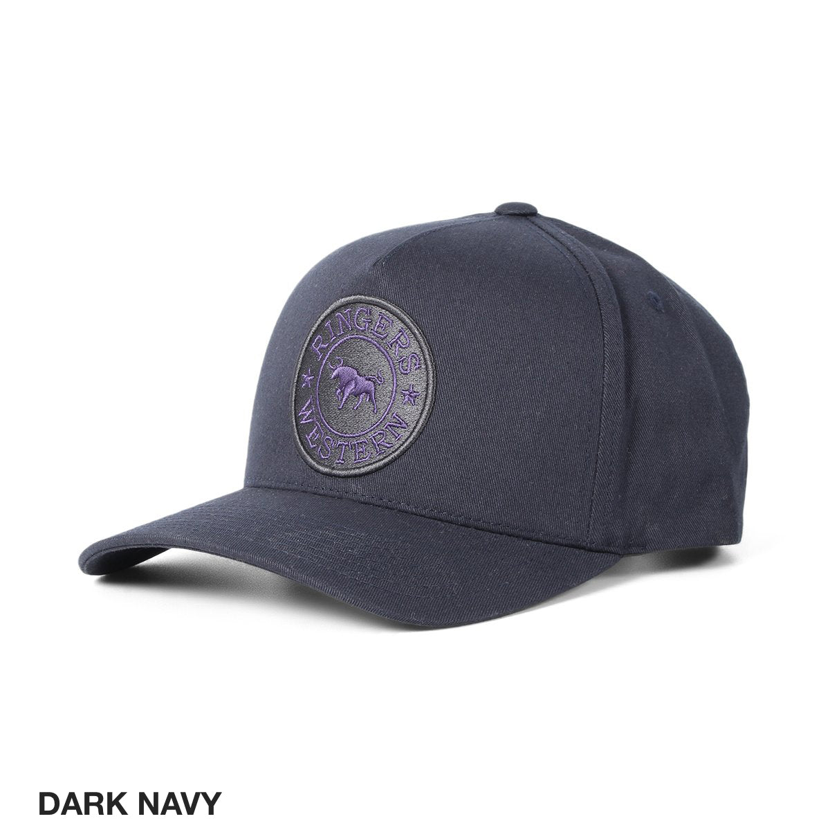 A Ringers Western Grover Baseball Cap in dark navy with a flat brim. The front is adorned with an embroidered circular patch displaying the text "Ringers Western" and a bull silhouette in the center. An adjustable strap ensures a perfect fit, while "DARK NAVY" is visible in the bottom-left corner of the image.