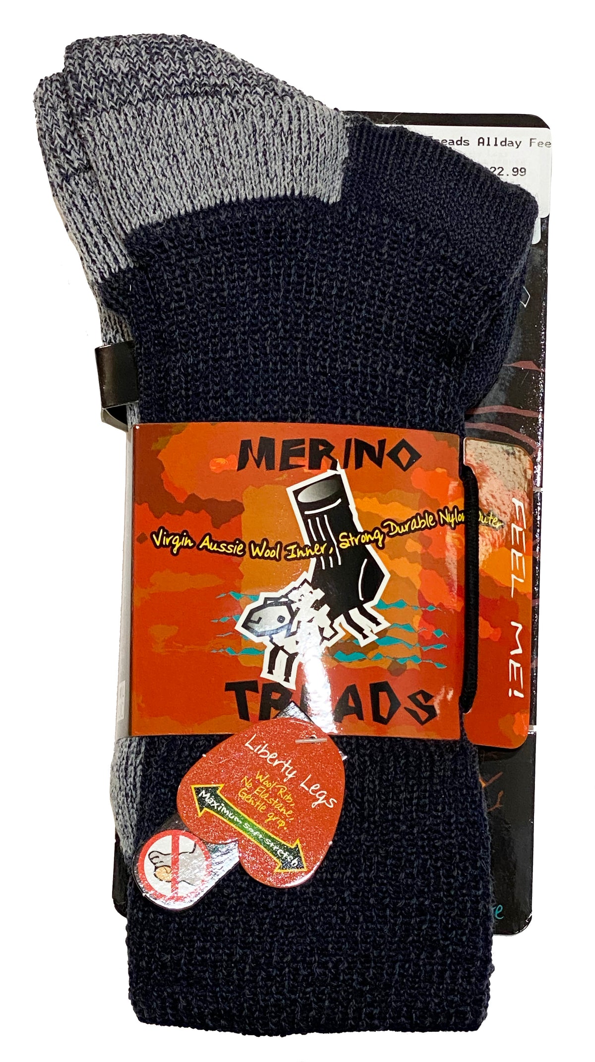 A pair of Merino Treads Liberty Legs Health Top, your ideal outdoor everyday sock, featuring a blend of grey and dark blue colors. The packaging highlights "Virgin Aussie Wool Inner" and "Strong Durable Nylon," with an illustration of a sheep and the slogan "Happy Legs Feel Me!" Proudly Australian made socks.