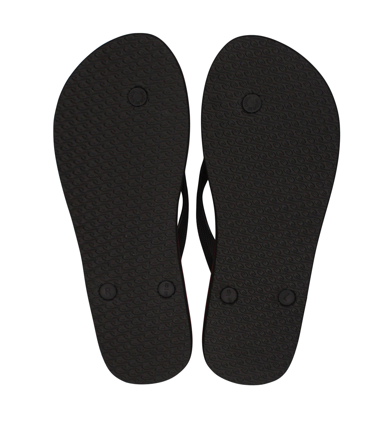The image shows the soles of Rip Curl Icons Thongs, highlighting textured patterns and small circular grips. Made with premium EVA rubber footbed, the soles are marked "R" and "L" for right and left, featuring an ergonomic moulded strap for added comfort.