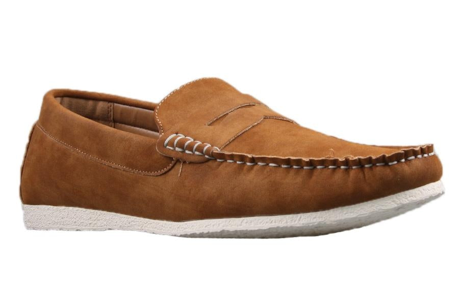 The UNcut Waves Shoe is a brown suede slip-on with white stitching and a white rubber sole. These moccasin-style loafers feature visible seams along the front and sides, providing a casual look perfect for everyday wear. Available in UK sizing.