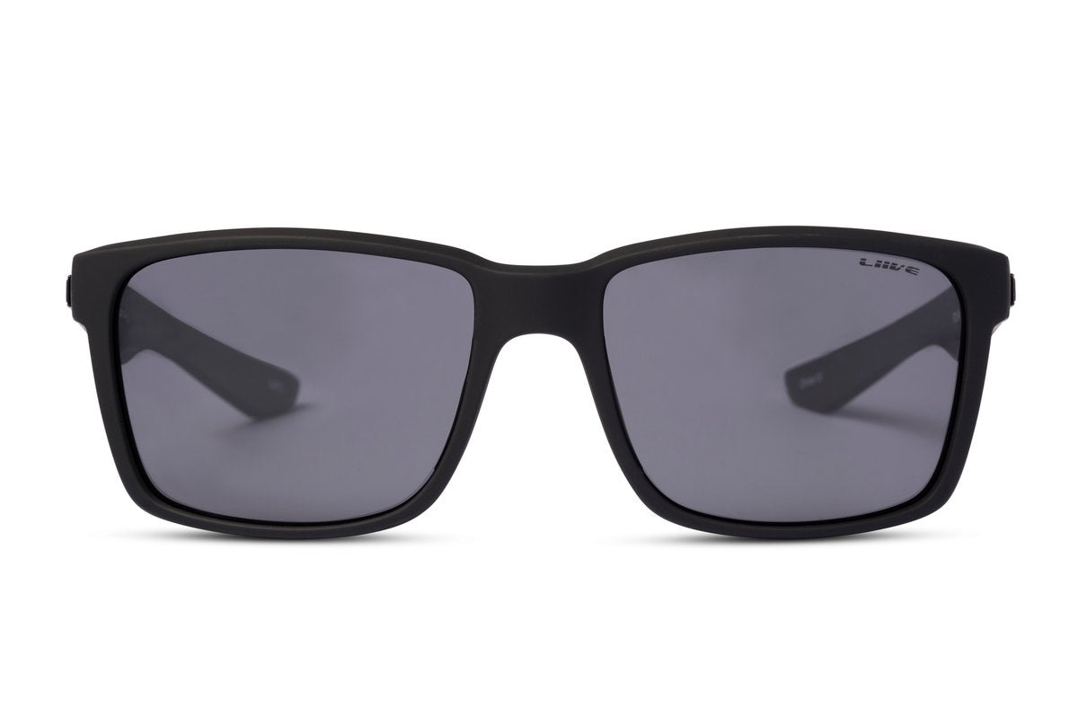A pair of black square-framed Liive Moto Polar Sunglasses with polarized grey lenses is displayed against a white background. The wide temples offer UV protection, and the overall design is modern and sleek.