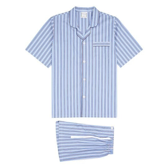 The Koala Tradition Short Leg PJ is a two-piece set of men's summer pyjamas displayed on a white background. The set includes a short-sleeved button-up top and matching shorts, both featuring vertical stripes in shades of blue and white. Made from a blend of Polyester and Cotton, the casual and comfortable top has a single chest pocket accented with white piping.