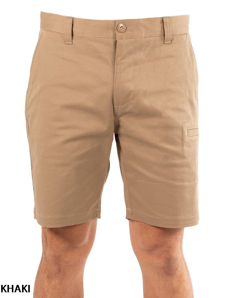 A person wears the UNIT Ignition Stretch Short—durable, stretch khaki shorts with belt loops, button closure, small side pocket, and above-the-knee fit. "KHAKI" is shown in the lower left corner.