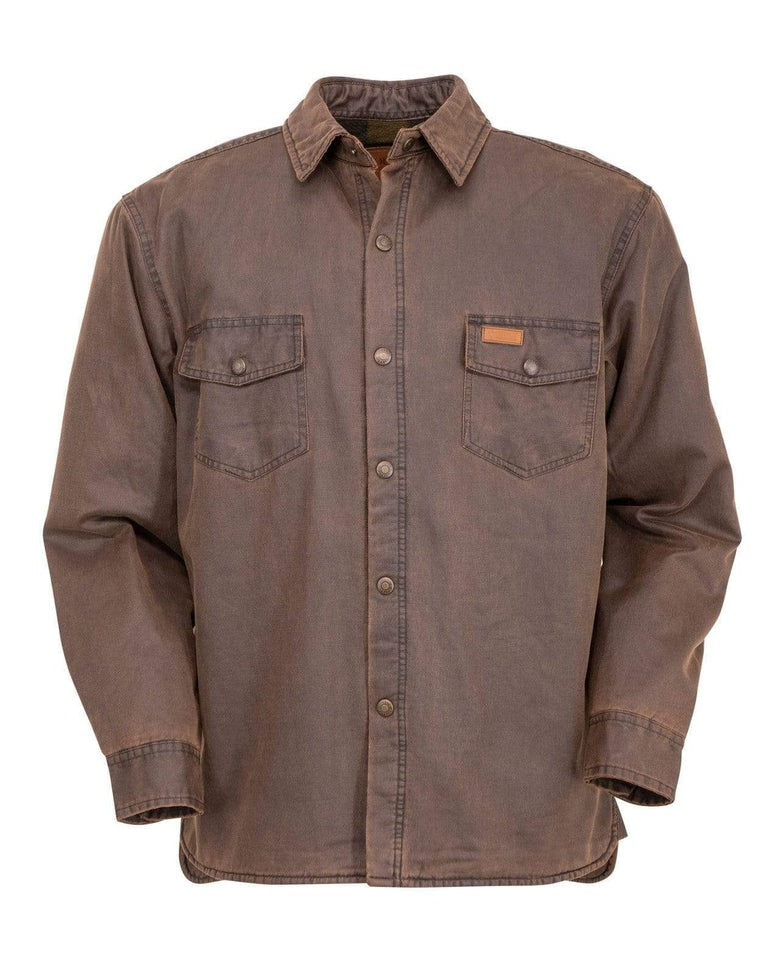 The Outback Loxton Jacket features a brown corduroy texture with a water-resistant finish, two chest pockets with buttoned flaps, and a small leather patch. It has a pointed collar, polar fleece lining for warmth, and long sleeves ending in buttoned cuffs.