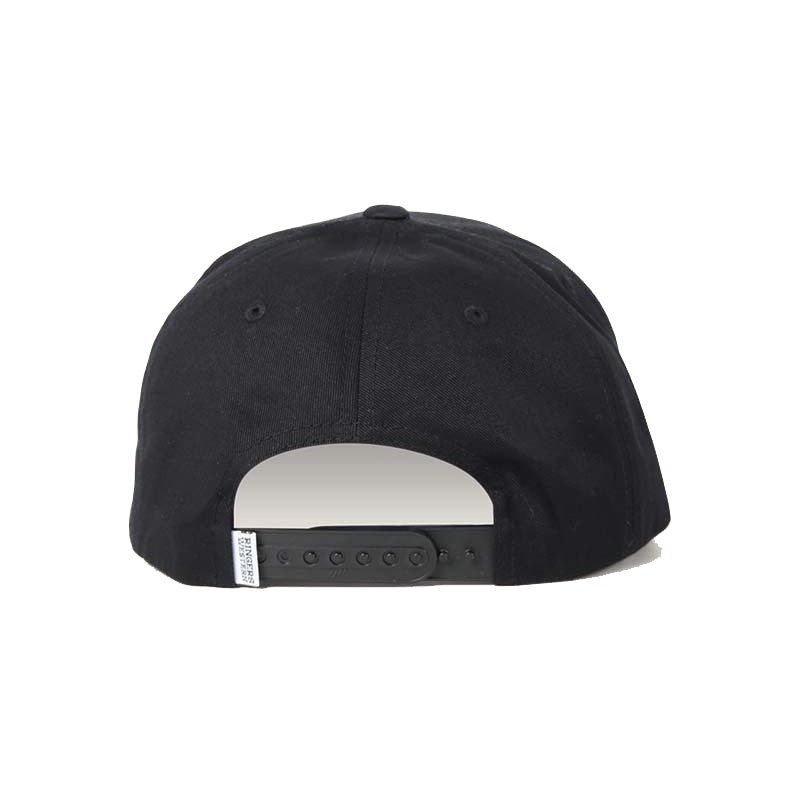 The image showcases the back of the black Ringers Western Grover Baseball Cap, which includes an adjustable strap and a small white tag on the left side of the strap.