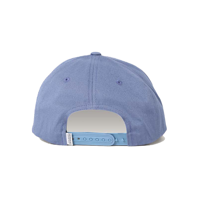 The image displays the back view of the Ringers Western Grover Baseball Cap in light blue, featuring an adjustable snap closure. The cap includes a button on top and visible stitching along the seams, with multiple holes on the adjustment strap for size customization.