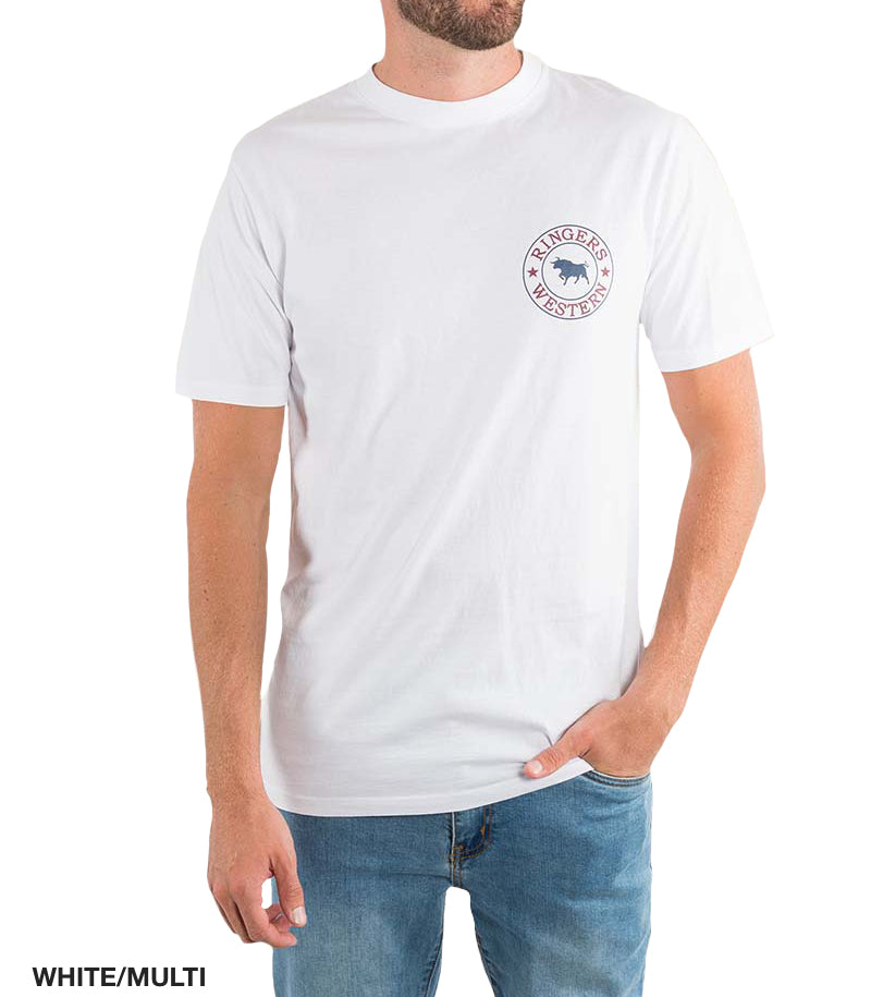 The man embodies relaxed style in a Ringers Western Signature Bull Classic T-Shirt, a white short-sleeve tee with a small circular bull logo. With one hand in his blue jeans pocket, "WHITE/MULTI" is subtly displayed at the bottom corner of this 100% cotton piece.