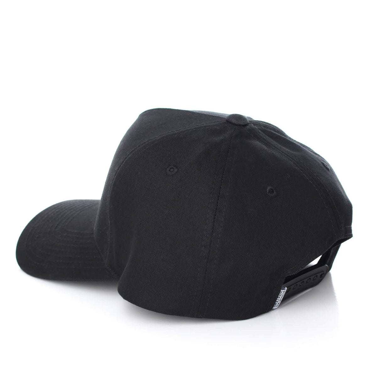 A Ringers Western Grover Baseball Cap is displayed from the back and side, resting on a white surface. This black cap features an adjustable strap with a snap closure.