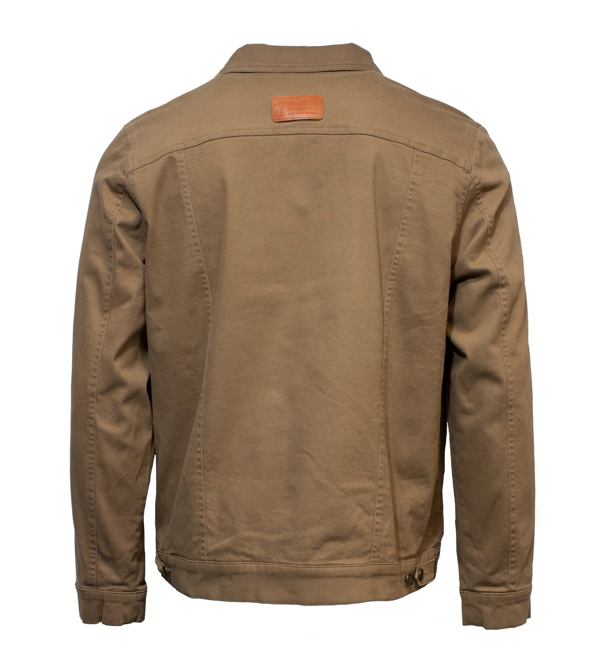 The Ritemate Pilbara Cotton Canvas Jacket is displayed from the back, highlighting its straightforward design. This tan-colored, classic fit jacket features a small brown leather patch near the upper center and adjustable buttoned tabs at the bottom sides. The sturdy and well-crafted fabric exemplifies Ritemate's commitment to quality.