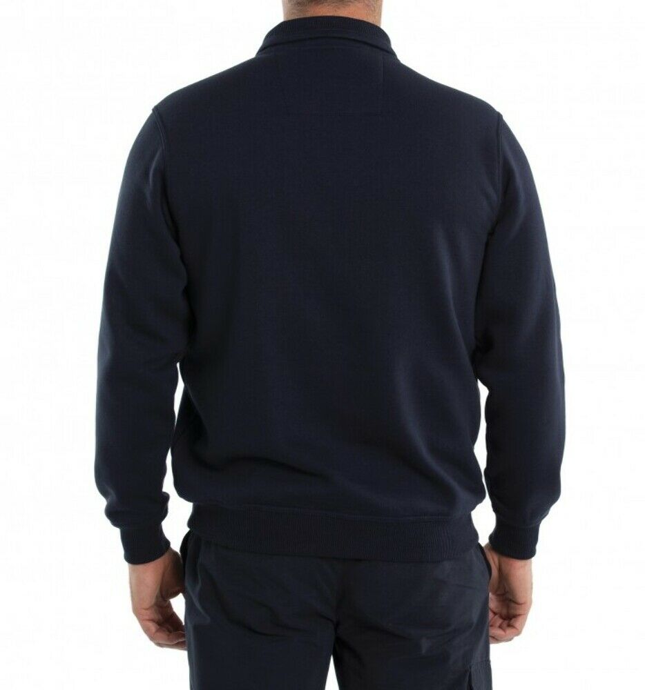 A person is standing with their back facing the camera, wearing the Breakaway Dex Snowy Mt Fleece Half Zip in navy blue and dark pants. The background is plain white.