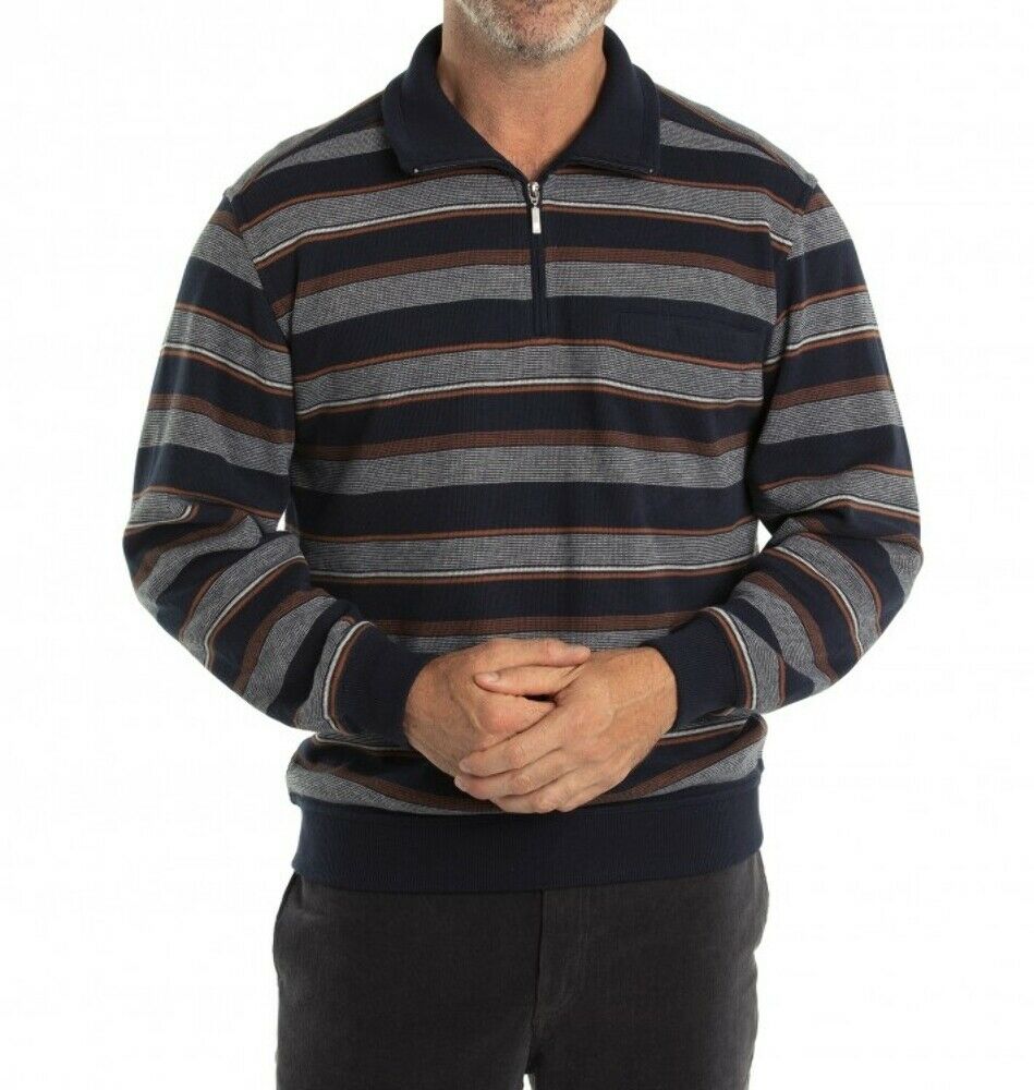 A person is wearing the Breakaway Jordan French Rib Half Zip, a long-sleeve, zip-up polo shirt with horizontal stripes in various shades of blue, gray, and occasional orange. The collar, cuffs, and hem are solid navy blue. This versatile jumper features a half-zip placket. The person has their hands loosely clasped in front of them.