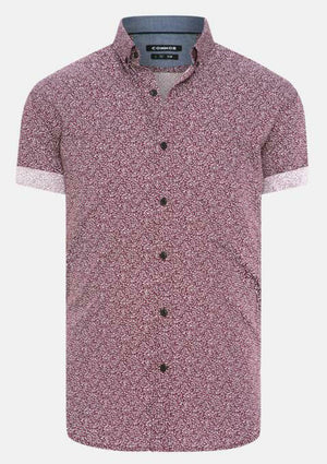 The Connor Tate Print Shirt is a slim fit, short-sleeved button-up in grape with a small pink and white floral pattern, black buttons, and a button-down collar. The label reads "CONDOR.