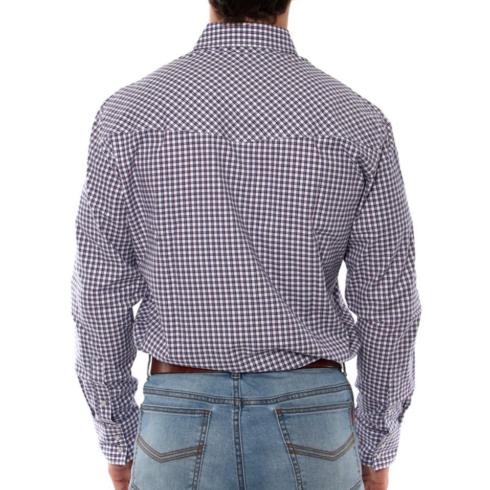 A person is shown from the back wearing a Ringers Western Wyoming Shirt, a long-sleeved, checkered shirt in shades of white, purple, and navy blue. Made from 100% cotton, this semi-fitted shirt pairs perfectly with their light blue jeans. The person's left hand is partially visible, resting by their side.